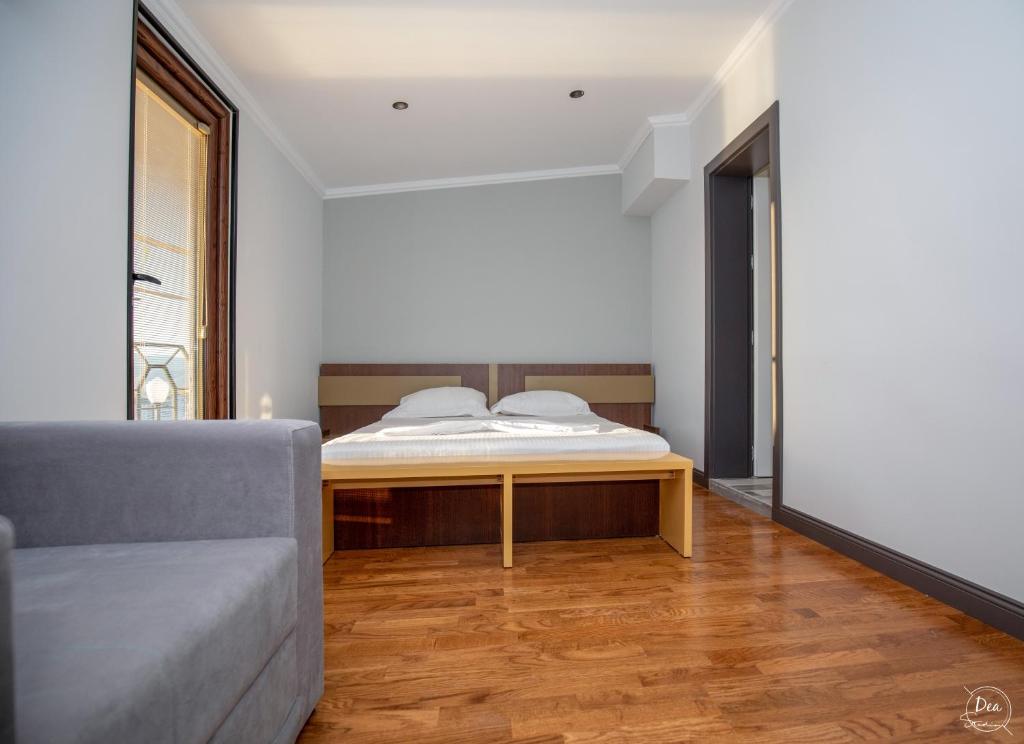 Postel nebo postele na pokoji v ubytování Suite Terrace Rooms & Apartments