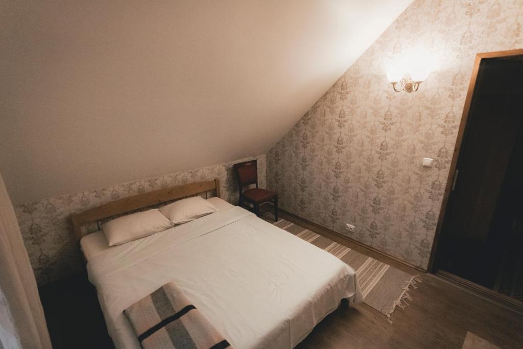 Postel nebo postele na pokoji v ubytování Tindioru Holiday House