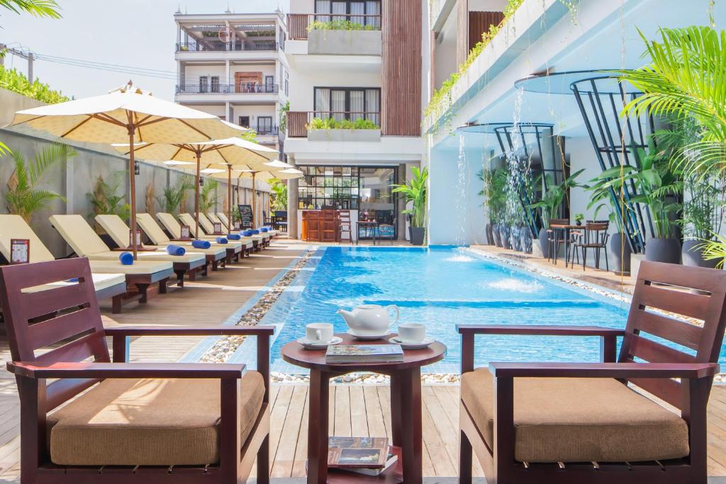 Siem Reap Palace Hotel & Spa tesisinde veya buraya yakın yüzme havuzu