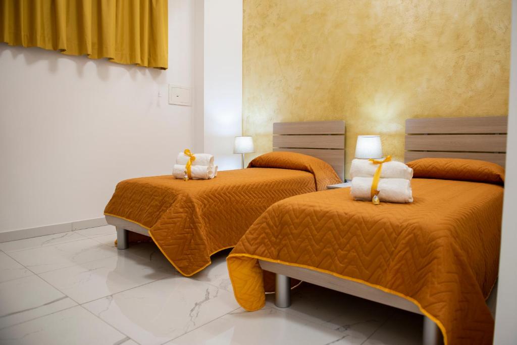 Łóżko lub łóżka w pokoju w obiekcie Stabia Dream Rooms