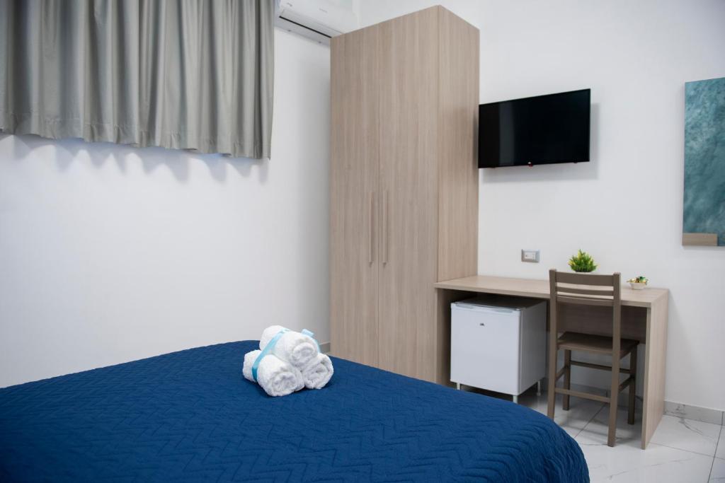 Łóżko lub łóżka w pokoju w obiekcie Stabia Dream Rooms