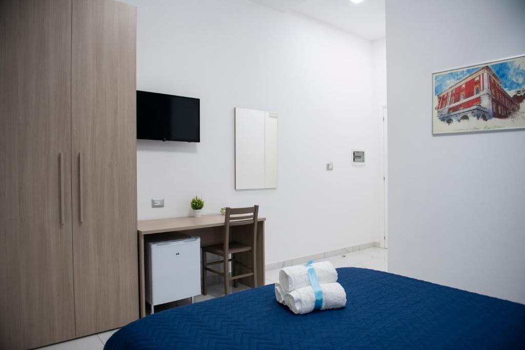 Łóżko lub łóżka w pokoju w obiekcie Stabia Dream Rooms