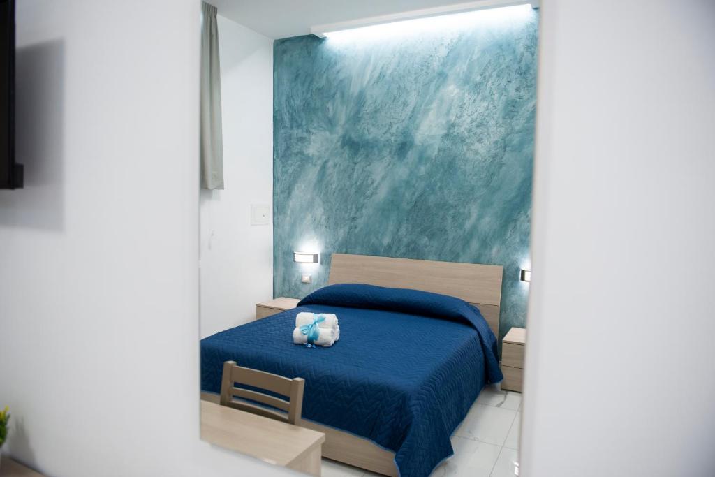 Łóżko lub łóżka w pokoju w obiekcie Stabia Dream Rooms