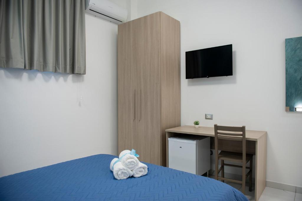 Łóżko lub łóżka w pokoju w obiekcie Stabia Dream Rooms