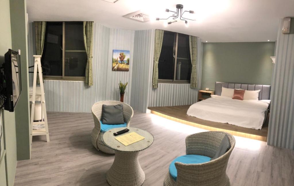 Postel nebo postele na pokoji v ubytování Sun Moon Lake Loft Inn