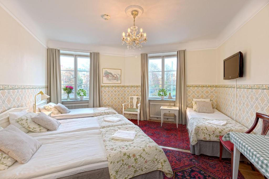 Postel nebo postele na pokoji v ubytování Wasa Park Hotel