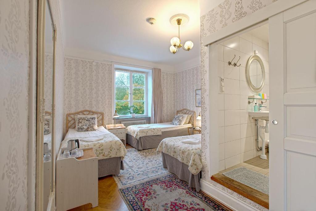Postel nebo postele na pokoji v ubytování Wasa Park Hotel