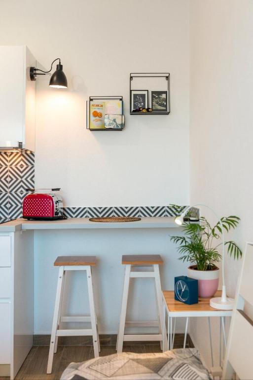 Kuchyň nebo kuchyňský kout v ubytování Narancin Apartments