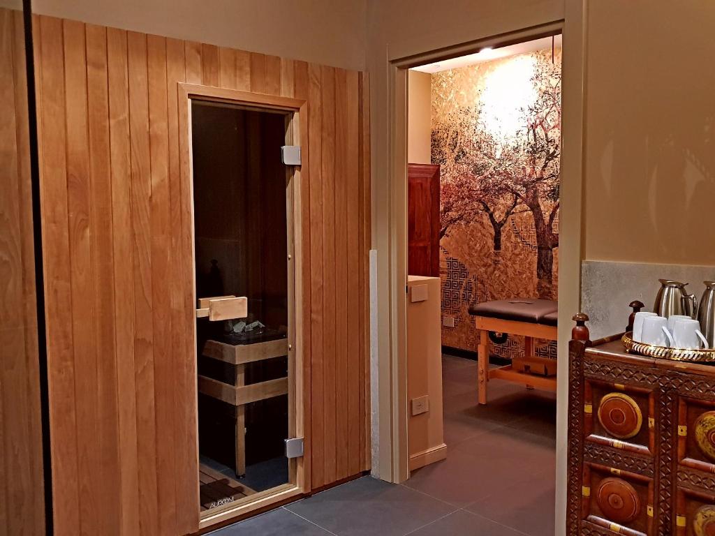 Llit o llits en una habitació de Hotel Astoria