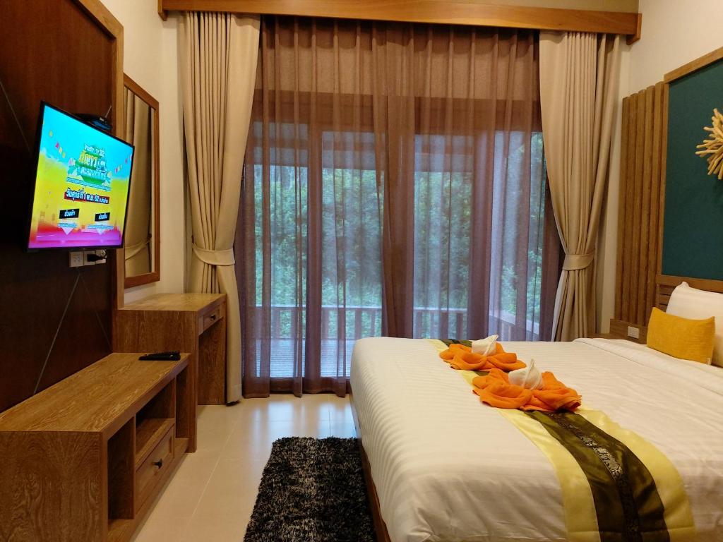 Postel nebo postele na pokoji v ubytování Thap Kaek B2 Villa
