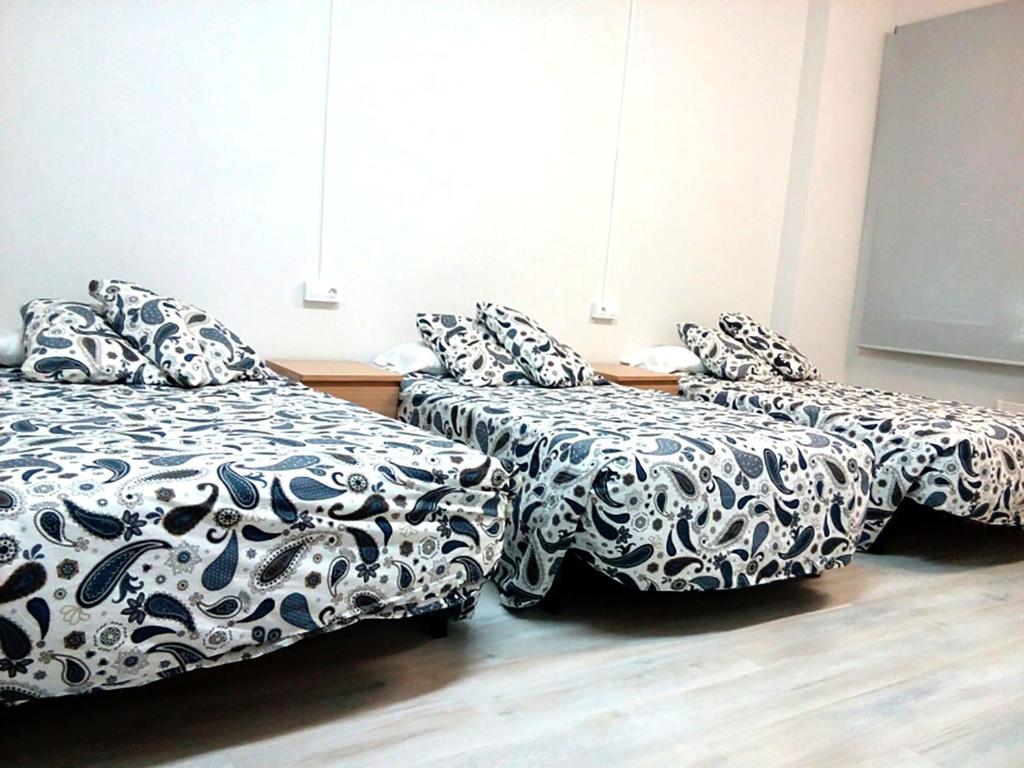 Voodi või voodid majutusasutuse Residencia Albergue Jaca toas