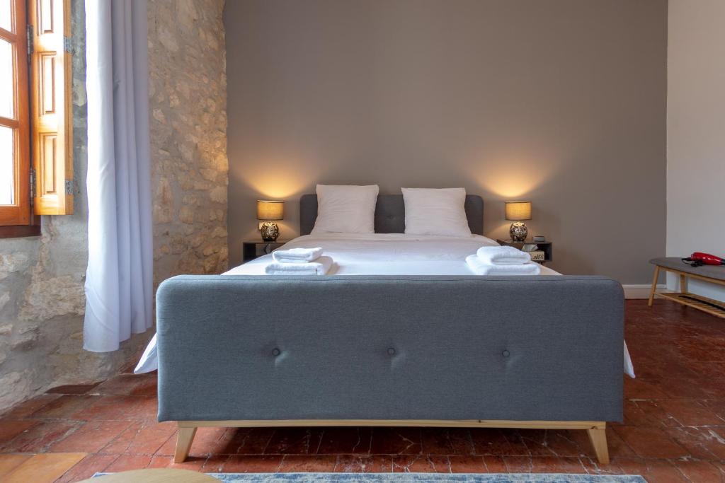Llit o llits en una habitació de Abitarela - Maison d'Hôtes - B&B