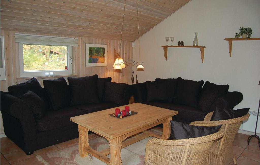Posezení v ubytování Holiday Home Nøddehaven Oksbøl Iv