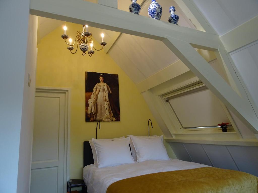 Postel nebo postele na pokoji v ubytování Emma's B&B