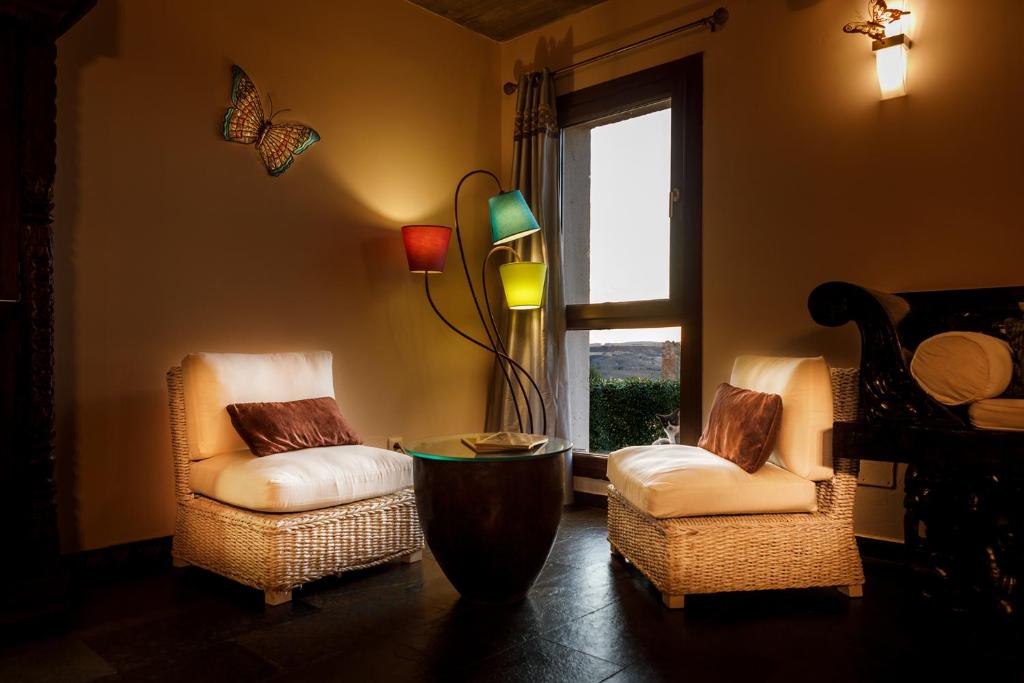 Postel nebo postele na pokoji v ubytování Eco Hotel Boutique & Spa Capitulo Trece - Adults Only