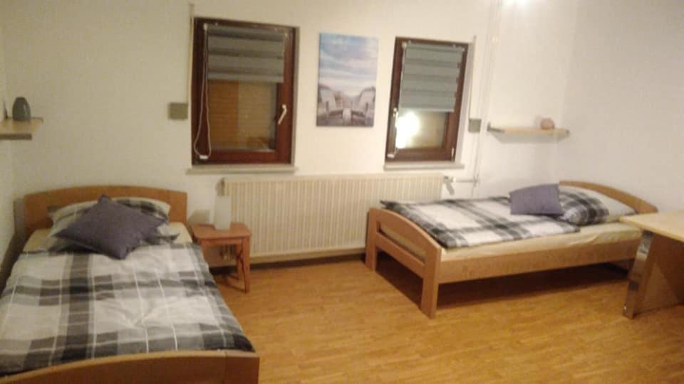 Postel nebo postele na pokoji v ubytování "Klein und Fein"-Monteurzimmer Pohlheim