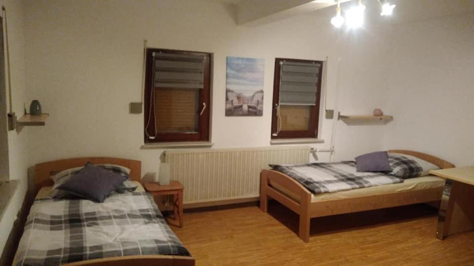Postel nebo postele na pokoji v ubytování "Klein und Fein"-Monteurzimmer Pohlheim