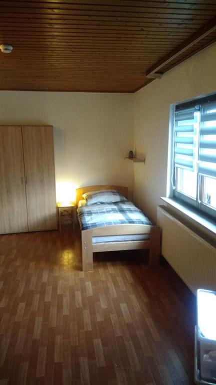 Postel nebo postele na pokoji v ubytování "Klein und Fein"-Monteurzimmer Pohlheim