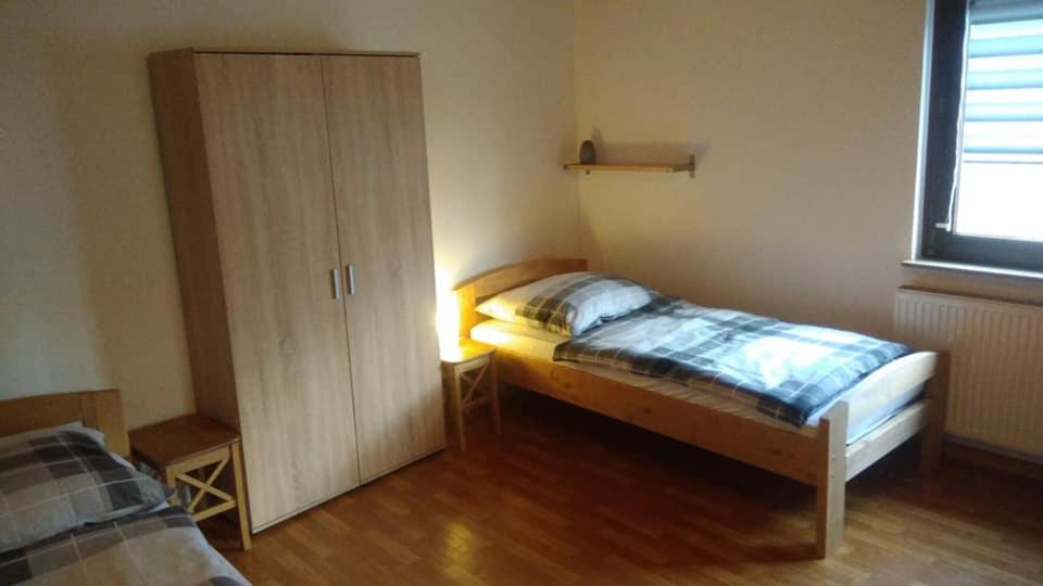 Postel nebo postele na pokoji v ubytování "Klein und Fein"-Monteurzimmer Pohlheim