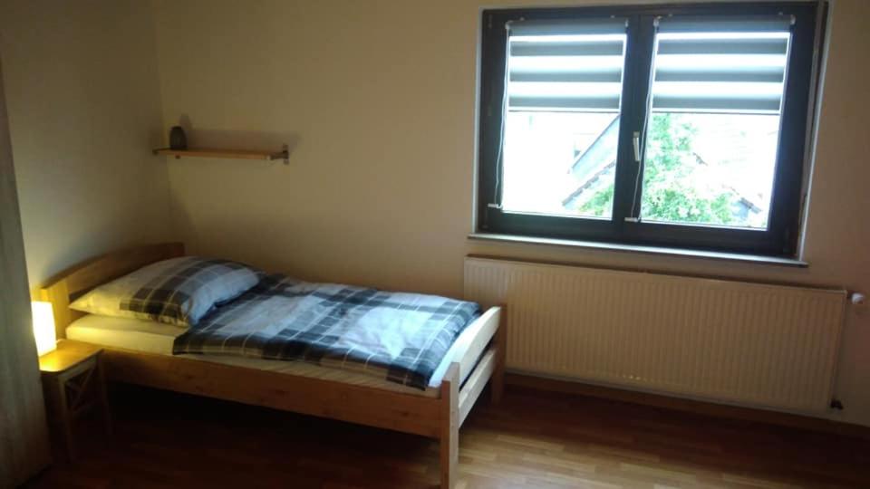 Postel nebo postele na pokoji v ubytování "Klein und Fein"-Monteurzimmer Pohlheim