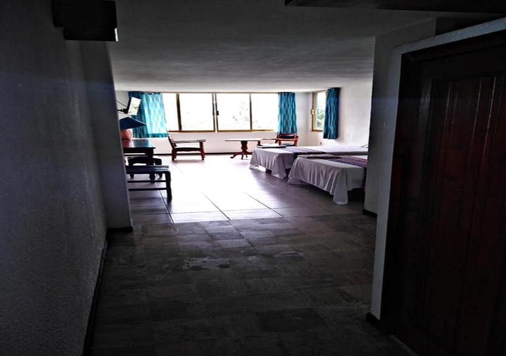 Postel nebo postele na pokoji v ubytování Hotel El Doral