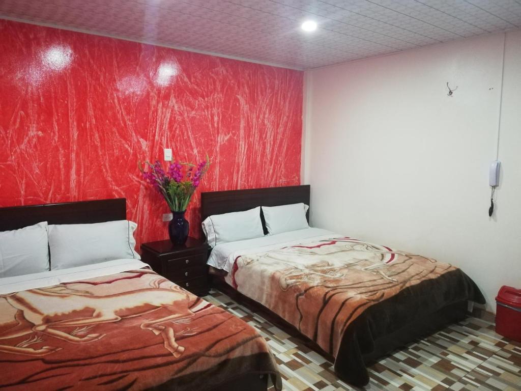 Postel nebo postele na pokoji v ubytování Hotel Gun Glub