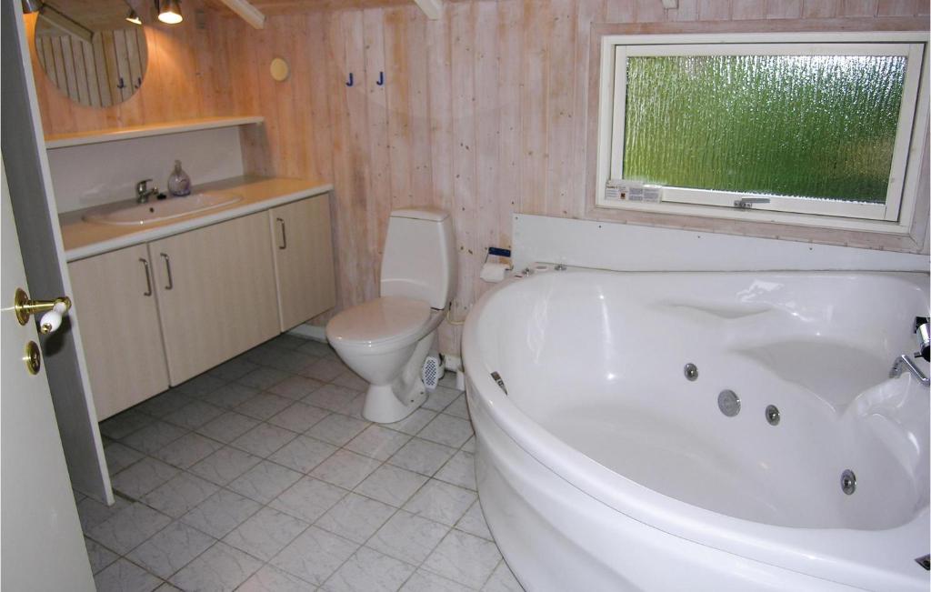 Koupelna v ubytování Holiday Home Laxtonvej Humble Denm