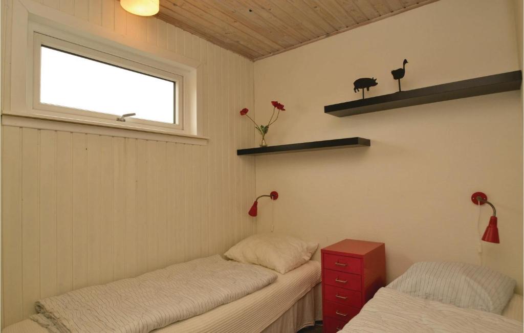 Postel nebo postele na pokoji v ubytování Holiday Home Klittoften