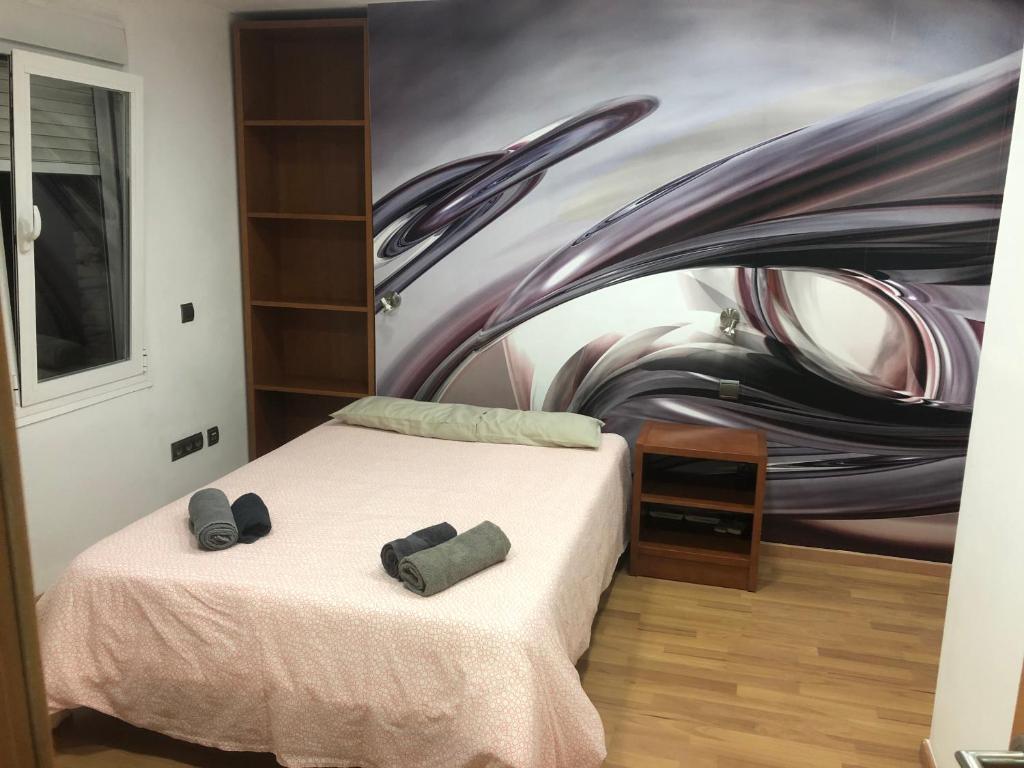 Postel nebo postele na pokoji v ubytování Ílios Soho Apartamentos