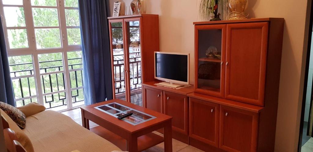 Una televisión o centro de entretenimiento en Casa Marta