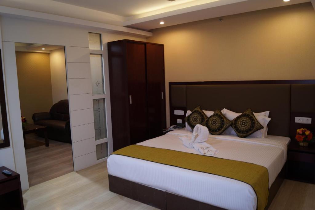 Postel nebo postele na pokoji v ubytování Hotel Winsar Park