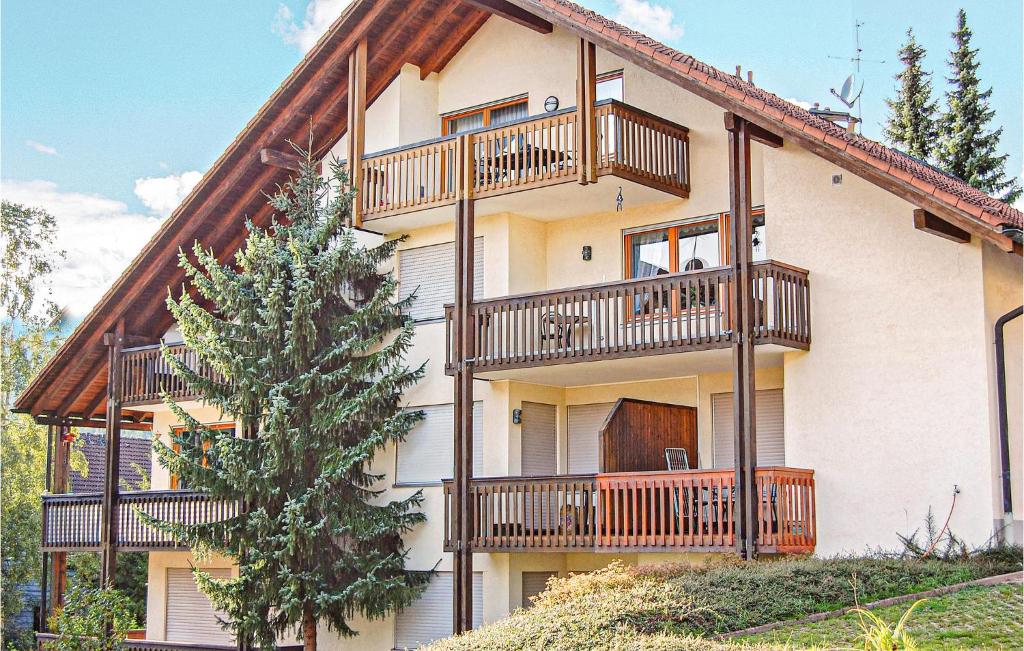 a building with balconies on the side of it at Beautiful Apartment In Todtmoos With 2 Bedrooms And Wifi in Todtmoos