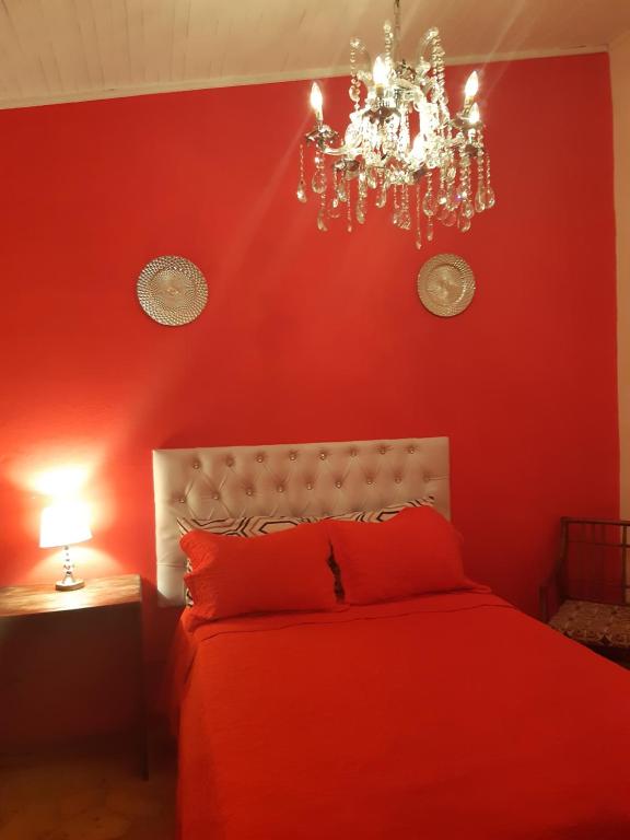 Postel nebo postele na pokoji v ubytování Hotel El Tronco Inc