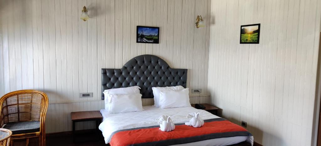 Postel nebo postele na pokoji v ubytování Arcadia Heritage Resort