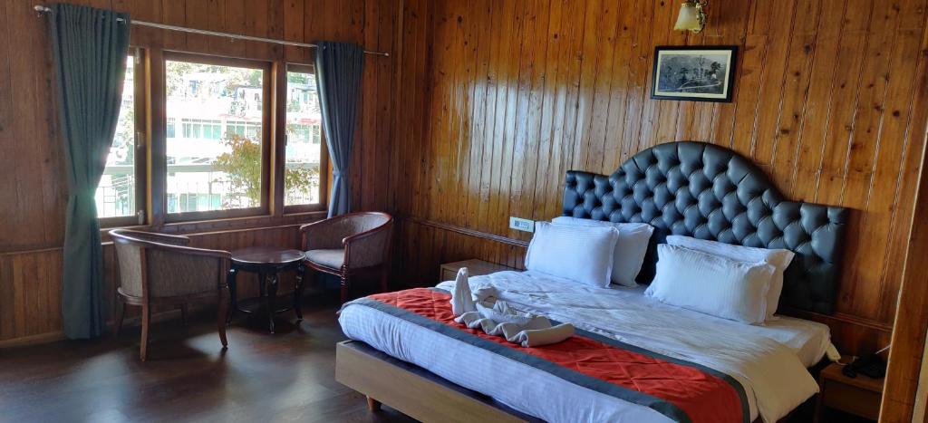 Postel nebo postele na pokoji v ubytování Arcadia Heritage Resort