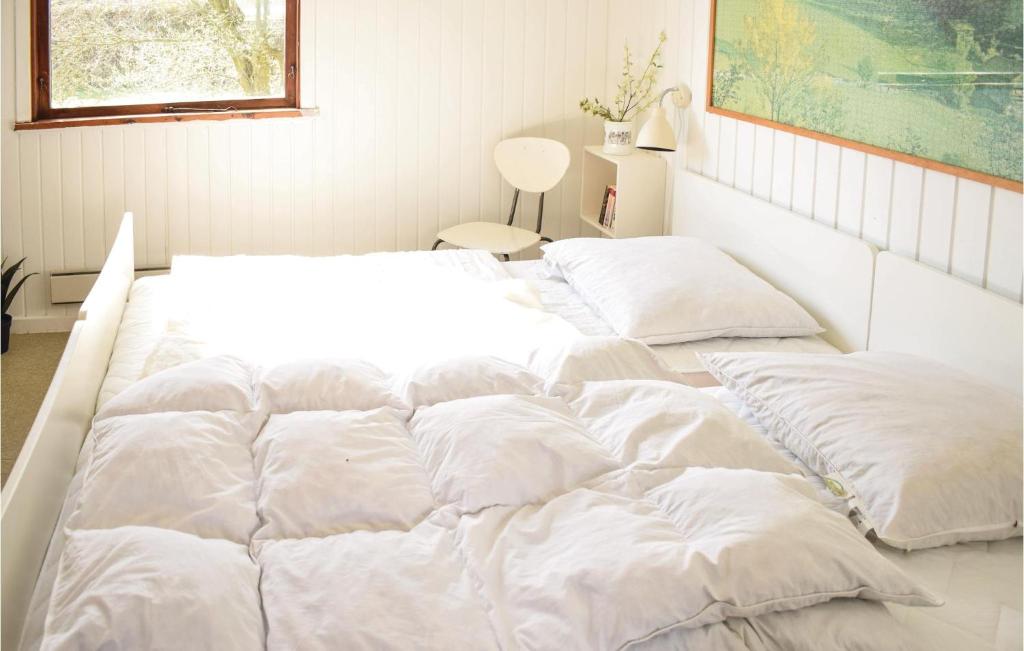 Postel nebo postele na pokoji v ubytování Holiday Home Engsvinget Bogense Iii
