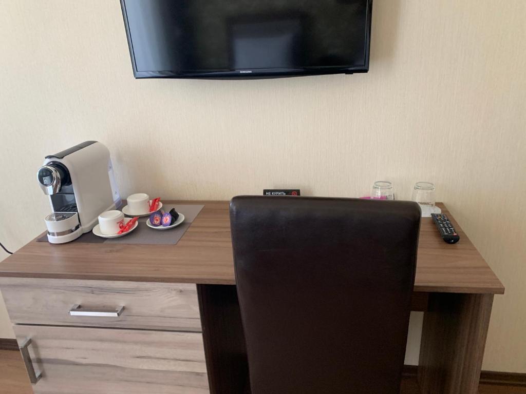 TV a/nebo společenská místnost v ubytování Hotel Gureli