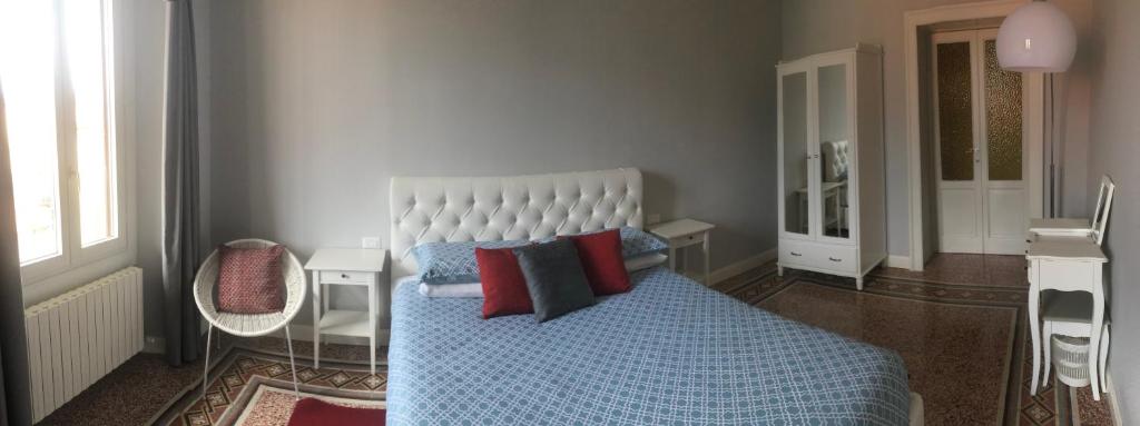 Łóżko lub łóżka w pokoju w obiekcie Casa Mauri