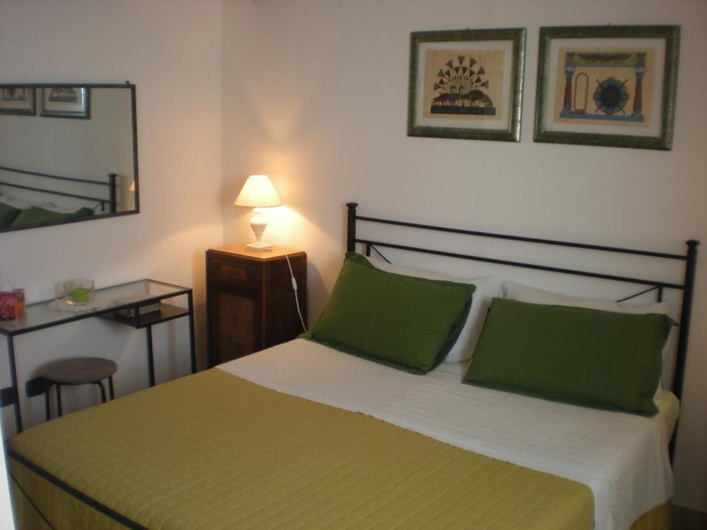 A bed or beds in a room at Case vacanza Reggimonti Cinque Terre