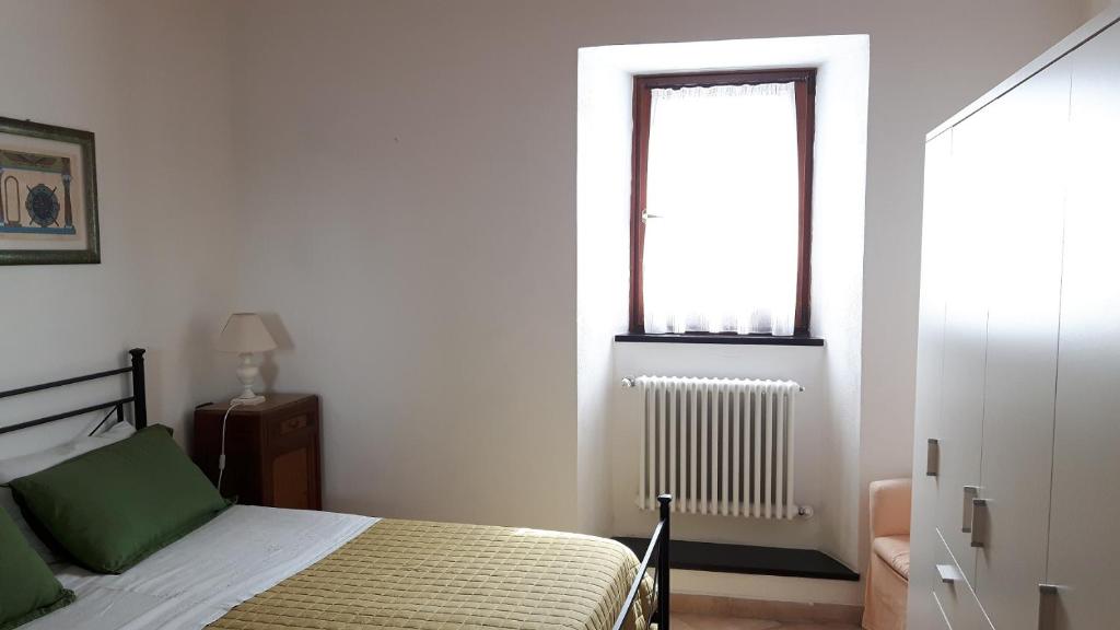 A bed or beds in a room at Case vacanza Reggimonti Cinque Terre
