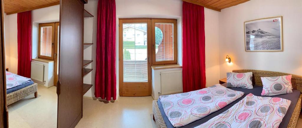 Postel nebo postele na pokoji v ubytování Chalet Neuhaus