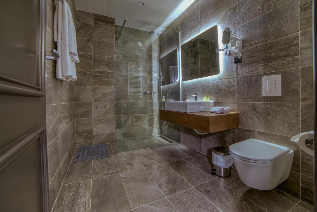 Koupelna v ubytování Boscovich Boutique Hotel