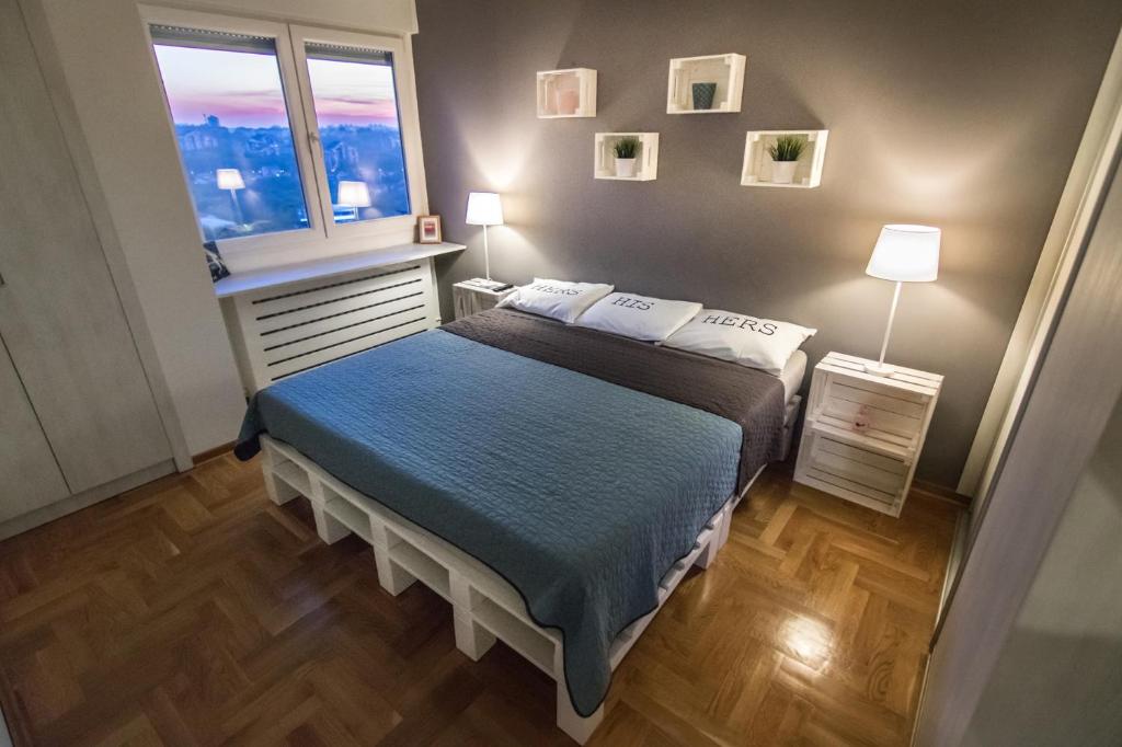 Postel nebo postele na pokoji v ubytování VortexLuxApatman