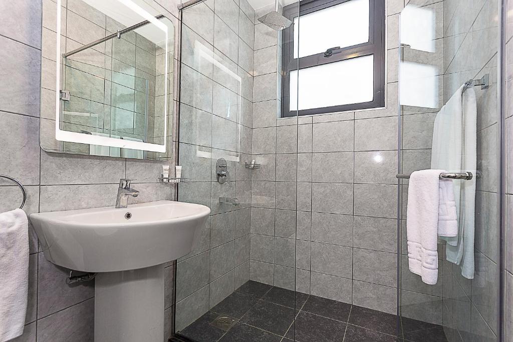 Koupelna v ubytování L'Aziz Suites