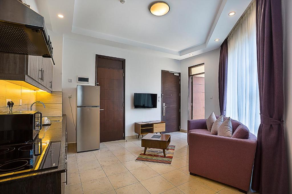 Kuchyň nebo kuchyňský kout v ubytování L'Aziz Suites