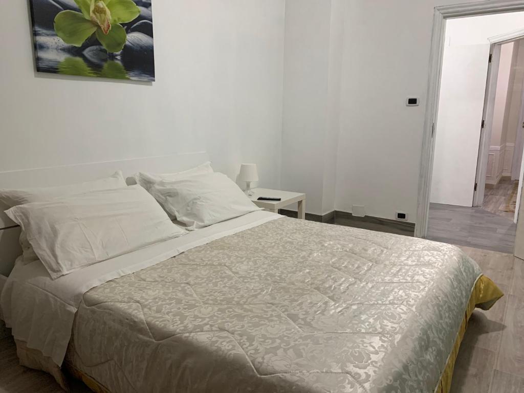 Postel nebo postele na pokoji v ubytování Albergo Lamanna Hotel digitale