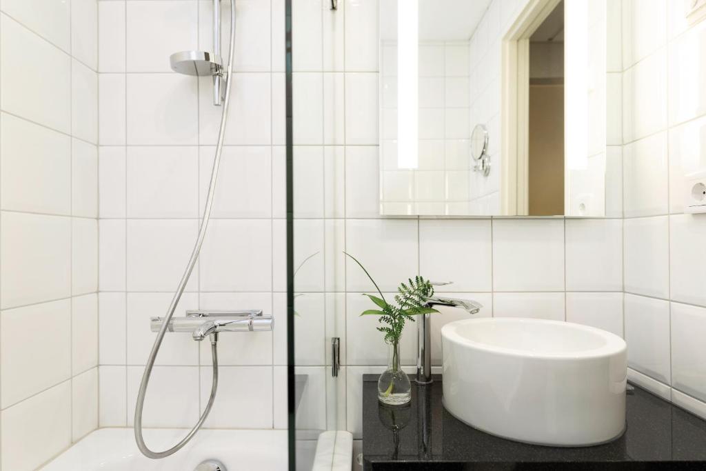 Koupelna v ubytování Elite Grand Hotel Norrköping