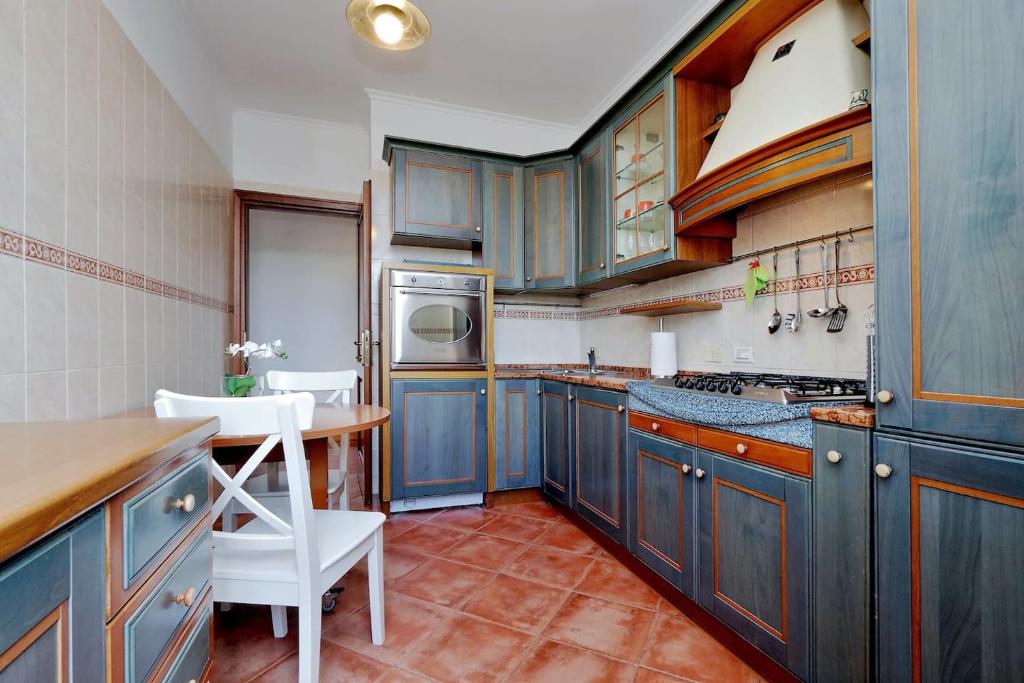 Kuchyňa alebo kuchynka v ubytovaní Colosseo Sunset Apartment