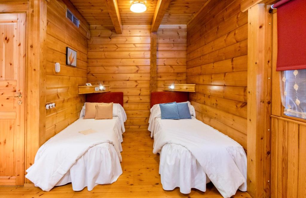 Posteľ alebo postele v izbe v ubytovaní Hotel Somlom - ECO Friendly Montseny