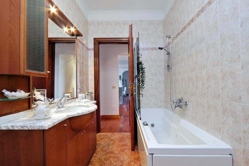 Kúpeľňa v ubytovaní Colosseo Sunset Apartment